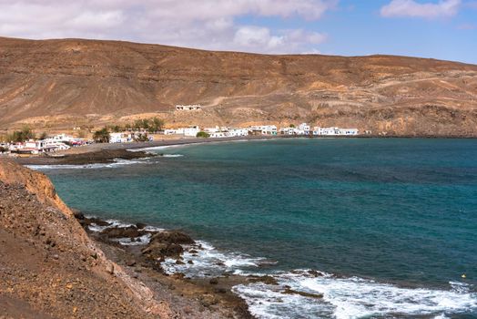 Cityscape on the beach of Pozo Negro on the island of Fuerteventura, Spain.