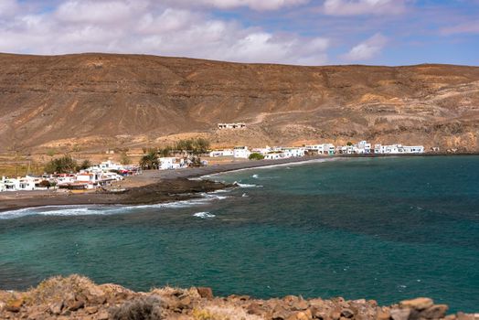 Cityscape on the beach of Pozo Negro on the island of Fuerteventura, Spain.