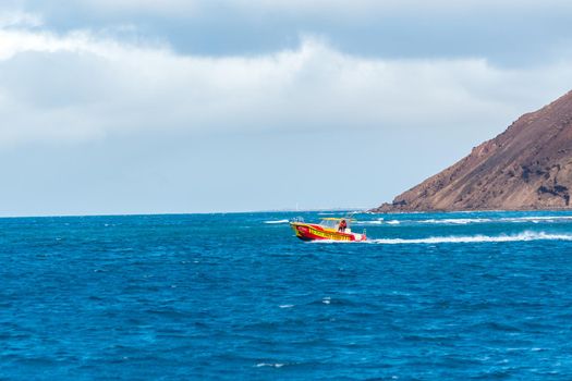 Corralejo, Fuerteventura, Spain: 2020 September 30: Fast Ferry in the port of Corralejo in Fuerteventura in the Canary Islands in Spain.