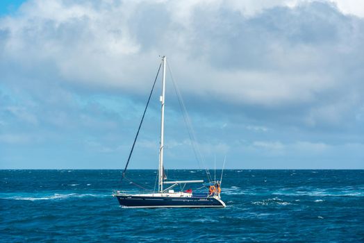 Corralejo, Fuerteventura, Spain: 2020 September 30: Boat in the sea near Corralejo in Fuerteventura in the Canary Islands in Spain.