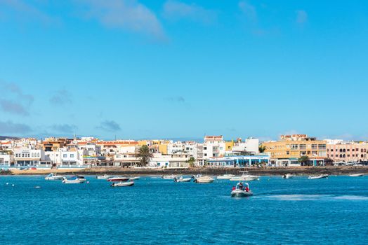 Corralejo, Fuerteventura, Spain: 2020 September 30: Sunny day in Corralejo from the sea in Fuerteventura on the Canary Islands in Spain.