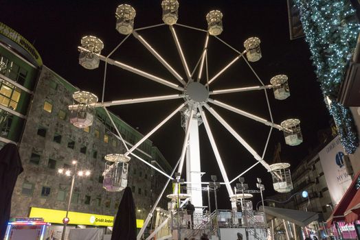 Andorra la Vella, Andorra : 2020 October 30 : Ferris wheel in the City of Andorra La Vella, capital of Andorra in the Pyrenees in autumn 2020.