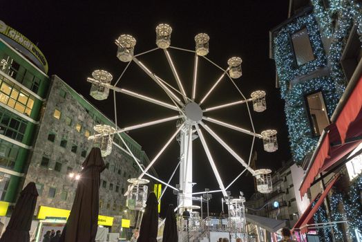 Andorra la Vella, Andorra : 2020 October 30 : Ferris wheel in the City of Andorra La Vella, capital of Andorra in the Pyrenees in autumn 2020.