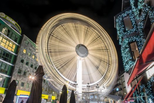Andorra la Vella, Andorra : 2020 October 30 : Ferris wheel in the City of Andorra La Vella, capital of Andorra in the Pyrenees in autumn 2020.