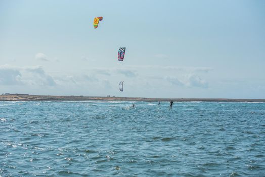 Fuerteventura, Spain : 2020 October 2 : Blonde Woman in the pratic Kite Surf in the Playas de los Charcos in El Cotillo on Fuerteventura in summer 2020.