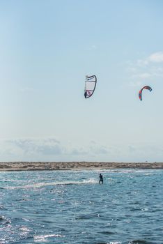 Fuerteventura, Spain : 2020 October 2 : Blonde Woman in the pratic Kite Surf in the Playas de los Charcos in El Cotillo on Fuerteventura in summer 2020.