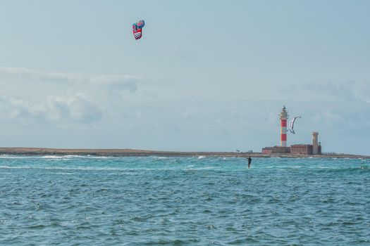 Fuerteventura, Spain : 2020 October 2 : Blonde Woman in the pratic Kite Surf in the Playas de los Charcos in El Cotillo on Fuerteventura in summer 2020.