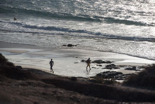 El Cotillo, Fuerteventura, Spain : 2020 October 1 :  People in the Coast in Fuerteventura at El Cotillo in the Canary Islands, Spain in summer 2020.