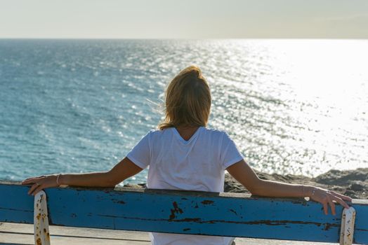 El Cotillo, Spain : 2020 October 1 : Young Blonde in the coast in Fuerteventura at El Cotillo in the Canary Islands, Spain in summer 2020.