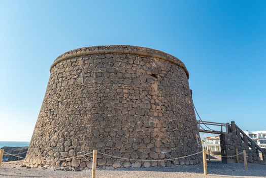El Castillo in the coast in Fuerteventura at El Cotillo in the Canary Islands, Spain in summer 2020.