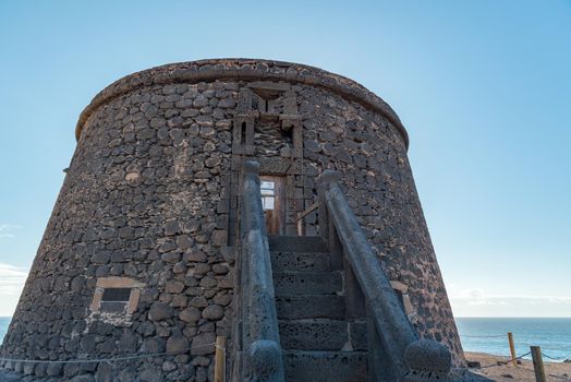 El Castillo in the coast in Fuerteventura at El Cotillo in the Canary Islands, Spain in summer 2020.