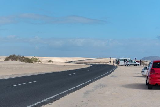 Corralejo, Fuerteventura, Spain: 2020 September 30: Cars on the route in the Parque Natual Dunas de Corralejo on Fuerteventura on the Canary Islands in Spain.