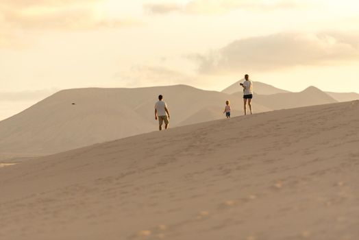 Corralejo, Fuerteventura, Spain: 2020 September 30: People in the dunes at the Parque Natual Dunas de Corralejo on Fuerteventura on the Canary Islands in Spain.