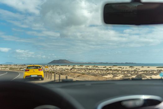 Corralejo, Fuerteventura, Spain: 2020 October 30: Inside the Rental car in the Dunas de Corralejo Natural Park in Fuerteventura, Spain in the fall of 2020.