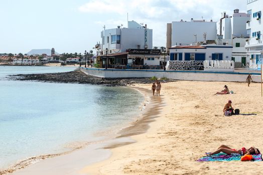 Corralejo, Fuerteventura, Spain: 2020 September 30: Sunny day on the beach of Corralejo in Fuerteventura on the Canary Islands in Spain.
