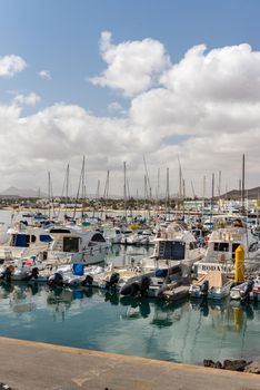 Corralejo, Fuerteventura, Spain: 2020 September 30: Sunny day in the port of Corralejo in Fuerteventura on the Canary Islands in Spain.