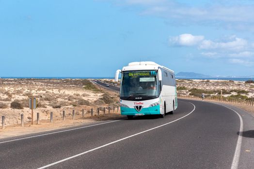 Corralejo, Fuerteventura, Spain: 2020 October 30: Bus in the Dunas de Corralejo Natural Park in Fuerteventura, Spain in the fall of 2020.