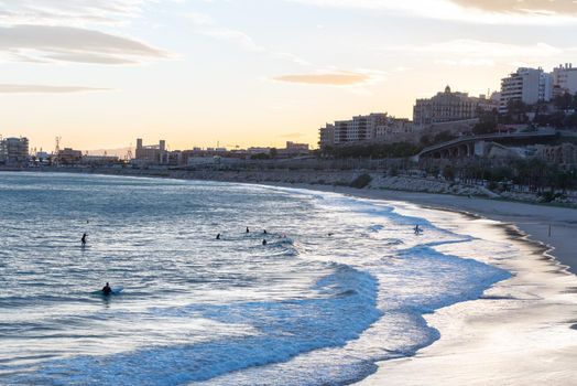 Tarragona, Spain: September 27, 2020: People surfing in the Plaza del Anfiteatro in Tarragona in the summer of 2020.