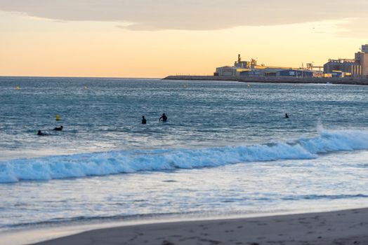 Tarragona, Spain: September 27, 2020: People surfing in the Plaza del Anfiteatro in Tarragona in the summer of 2020.