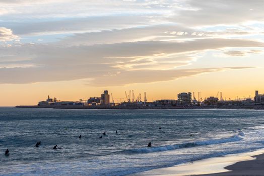 Tarragona, Spain: September 27, 2020: People surfing in the Plaza del Anfiteatro in Tarragona in the summer of 2020.