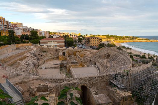Tarragona, Spain : 2020 September 27: Sunny day in Tarragona Amphitheatre in Spain - A UNESCO World Heritage Site in summer.