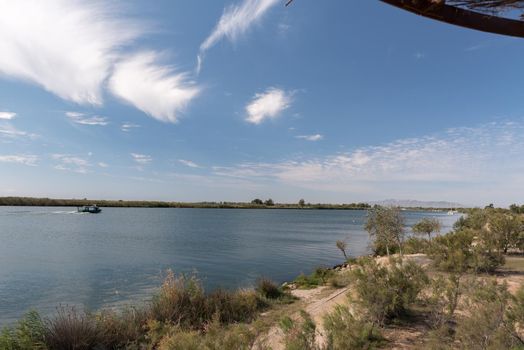 Boat Tour on the Ebro River in summer in the port.