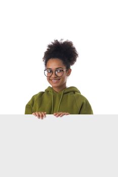 Portrait of african american mixed race woman with banner isolated on white background, casual people