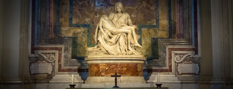 ROME, VATICAN STATE - August 28, 2018: Pietà di Michelangelo (The Pity), 1498-1499, located in St. Peter Basilica in Rome