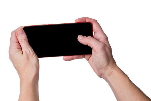Female hands holding smartphone with black screen taking photo, isolated on white background, free space, mockup for designer