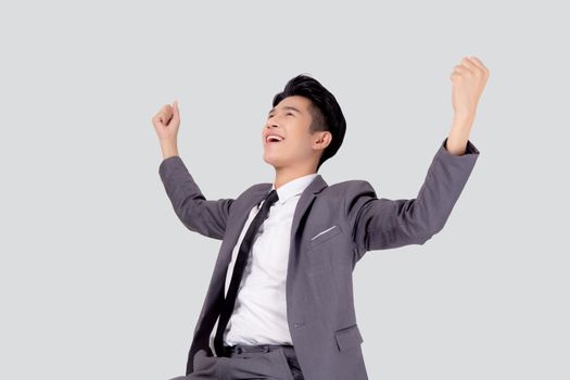 Portrait businessman in suit standing with win success isolated on white background, young asian business man is manager or executive having confident and excited is positive, expression and emotion.