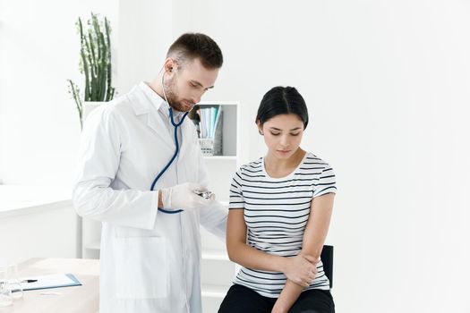 male doctor in white coat hospital health treatment. High quality photo