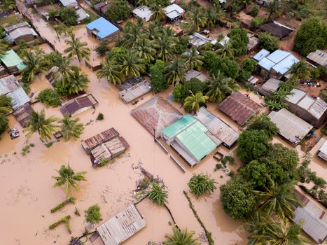 Aerial view overhead flooded houses after a cyclone