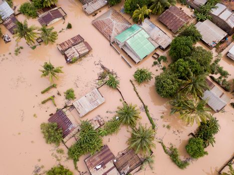 Aerial view overhead flooded houses after a cyclone