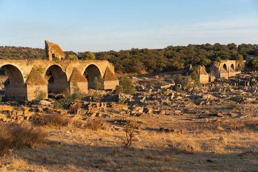 Destroyed abandoned Ajuda bridge crossing the Guadiana river between Spain and Portugal