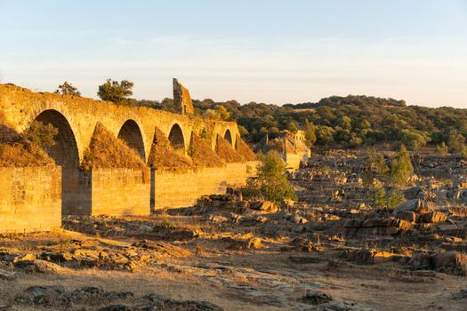 Destroyed abandoned Ajuda bridge crossing the Guadiana river between Spain and Portugal