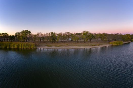 Lake drone aerial view at sunset in Alentejo, Portugal