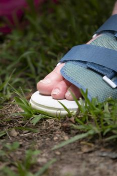 Woman wearing a shoe for a broken foot