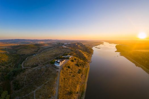 Juromenha castle, village and Guadiana river drone aerial view at sunrise in Alentejo, Portugal