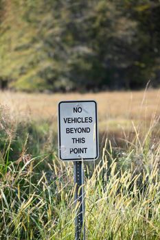 No Vehicles beyond This Point sign in nature