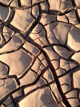 Image of cracked clay. Texture for background. Natural background for your design.