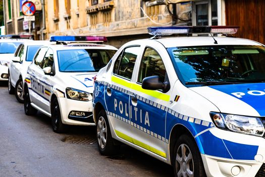 Romanian police (Politia Rutiera) car parked along the street in downtown Bucharest, Romania, 2021