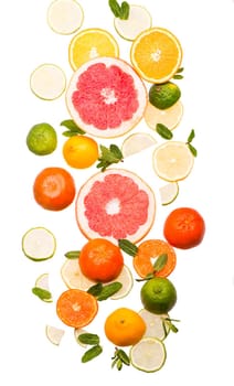 Citrus background. Fresh citrus fruits - Lemons, oranges, limes, grapefruits On wooden background