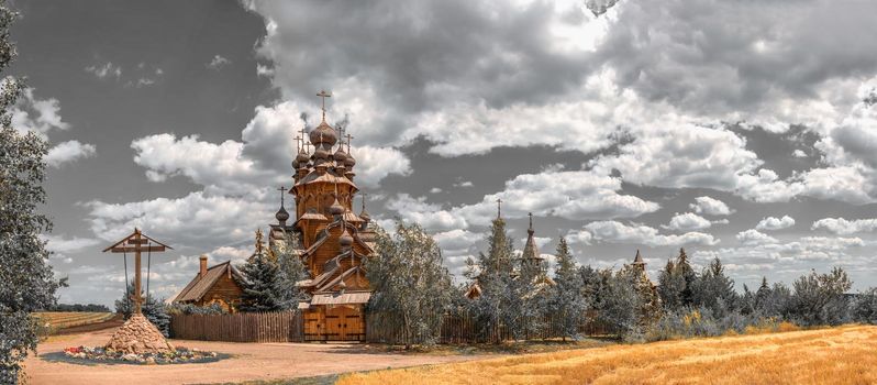 Svyatogorsk, Ukraine 07.16.2020.  Wooden All Saints skete, a part of the Svyatogorsk Lavra in Ukraine, on a sunny summer day