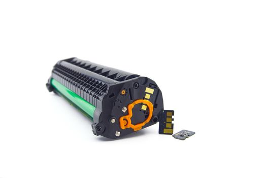 Laser printer toner cartridge and reset chip isolated on white background