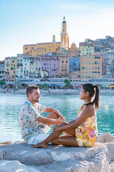 View on old part of Menton, Provence-Alpes-Cote d'Azur, France Europe during summer, couple men and woman on vacation at Menton France