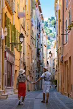 View on old part of Menton, Provence-Alpes-Cote d'Azur, France Europe during summer, couple men and woman on vacation at Menton France