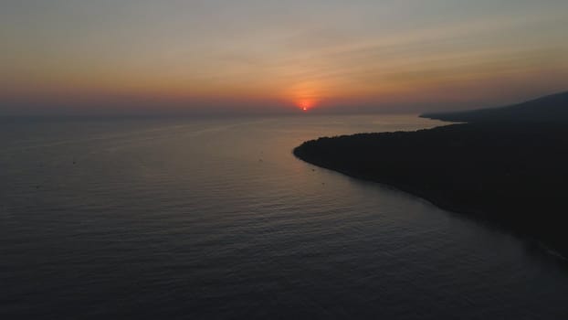 aerial view sunrise over ocean. seascape colorful sunrise over sea at tropical resort