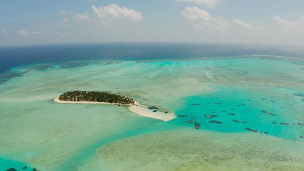 Sand beach and tropical islands by atoll with coral reef, top view. Onok Island, Balabac, Philippines. Summer and travel vacation concept