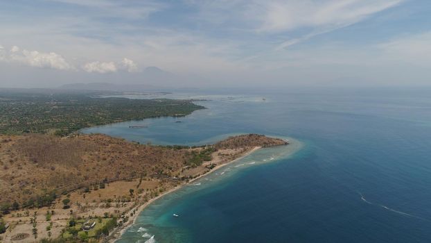 sea coast with tropical beach. aerial seascape tropical landscape, sea, boats on the surface water. Bali,Indonesia, travel concept.