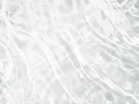Ripple water texture on white background. Shadow of water on sunlight. Mockup for product, spa or travel background. Marble blue water surface as wallpaper background